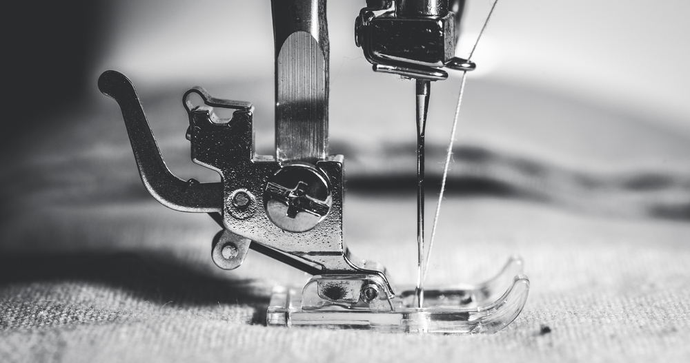 Sewing machine foot and needle.